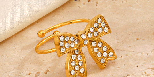 Adjustable gold stainless steel bow ring with rhinestones for women, wholesale fashion jewelry