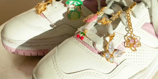 Decorative stainless steel shoe charms with butterfly, cherry, mushroom, and flower enamel pendants on sneakers