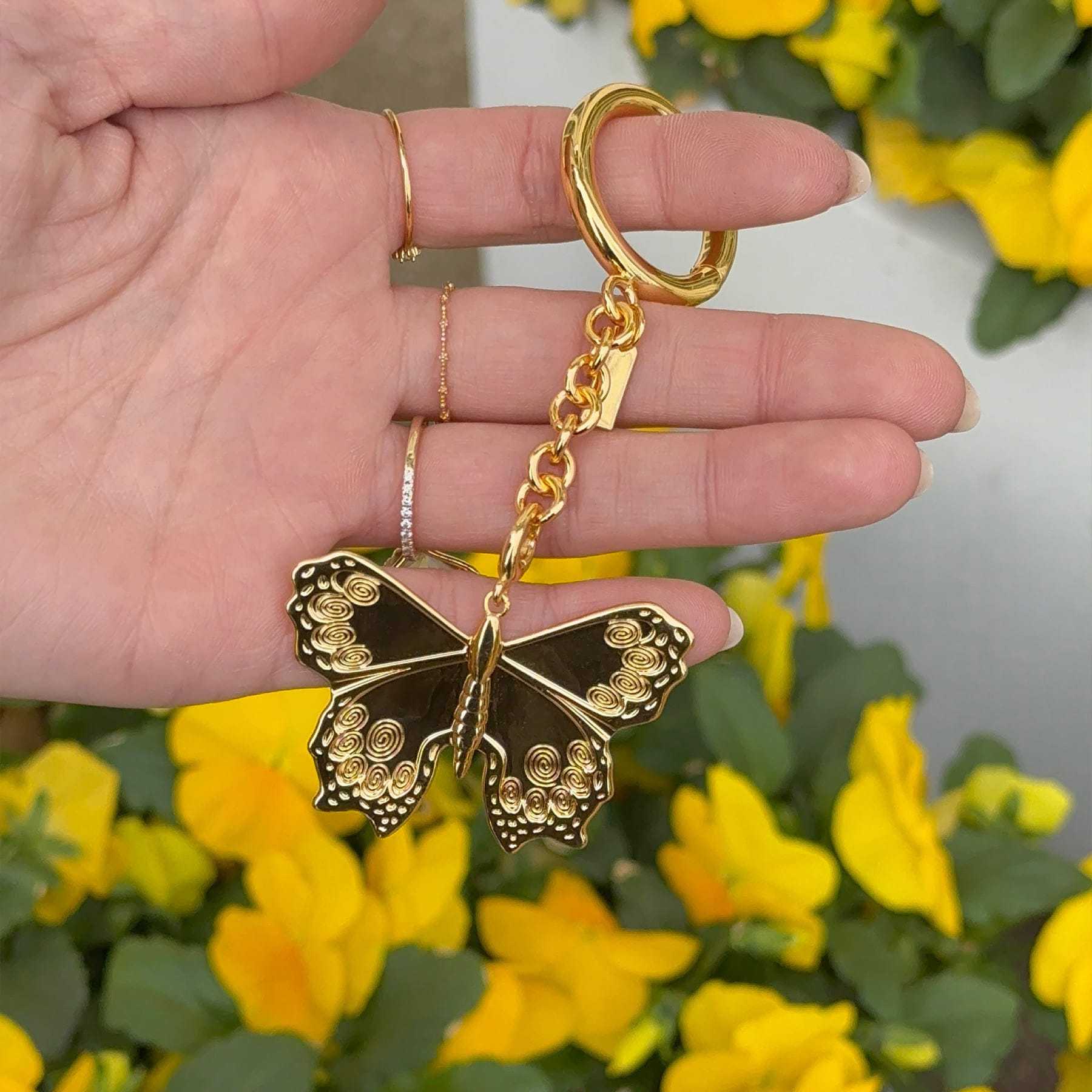 Stainless Steel Butterfly Keychain Charm with Gold Detailing for Bags