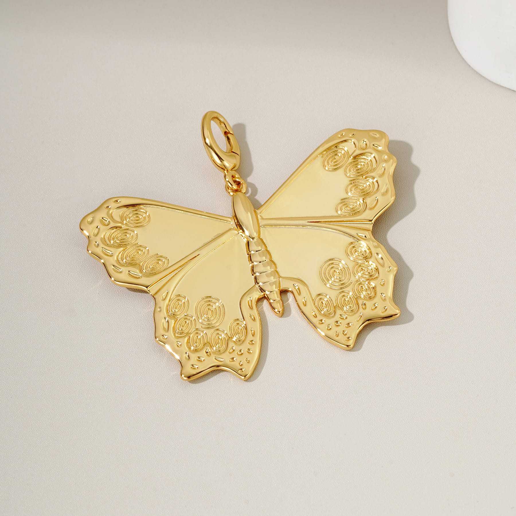 Stainless Steel Butterfly Keychain Charm with Gold Detailing for Bags