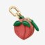 Wholesale peach PU leather handbag charm – fruit-shaped bag accessory for women