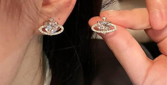 Heart planet cubic zirconia satellite stud earrings in silver – hypoallergenic wholesale jewelry