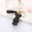 Rhinestone teddy bear keychain with wrist strap – sparkly bag charm accessory