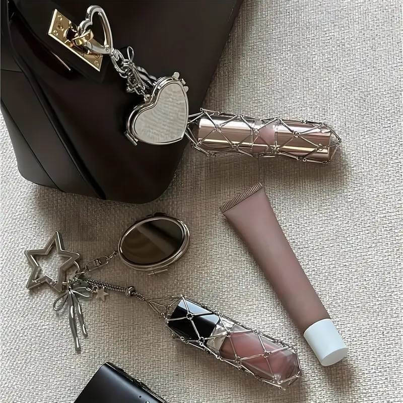 Custom metal chain lipstick holder keychain on black leather handbag