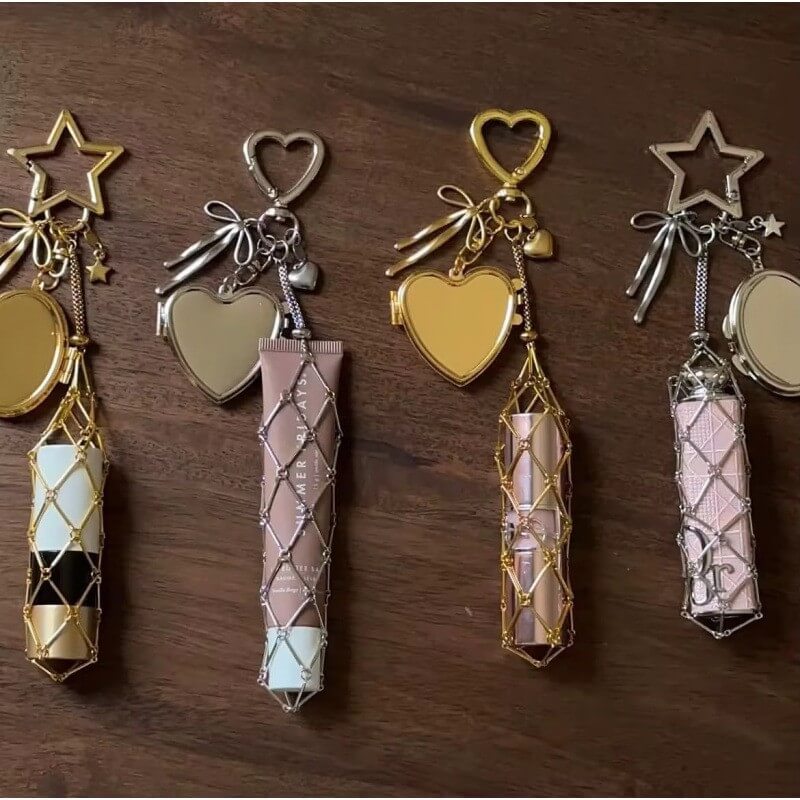 Custom metal chain lipstick holder keychain on black leather handbag